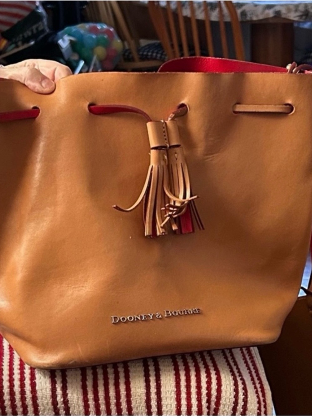 Dooney & Bourke Tan Drawstring Leather Serena  with Red Trim and Tassel